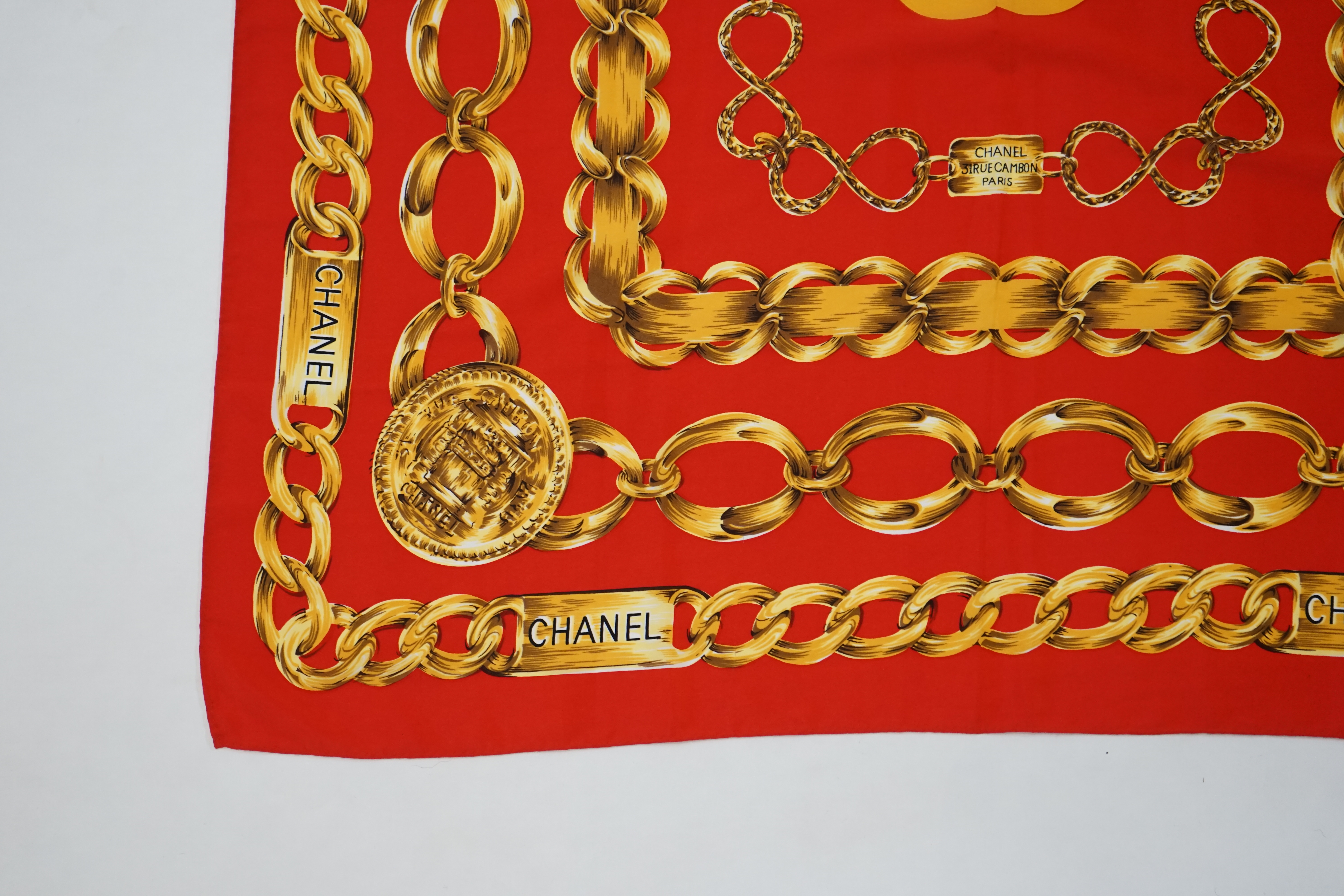 A Chanel Red Chain large silk scarf, 80cm x 80cm